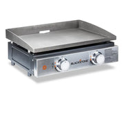 Silver Blackstone griddle for outdoor cooking on the 1666 N Atlantic I 22 tabletop setup