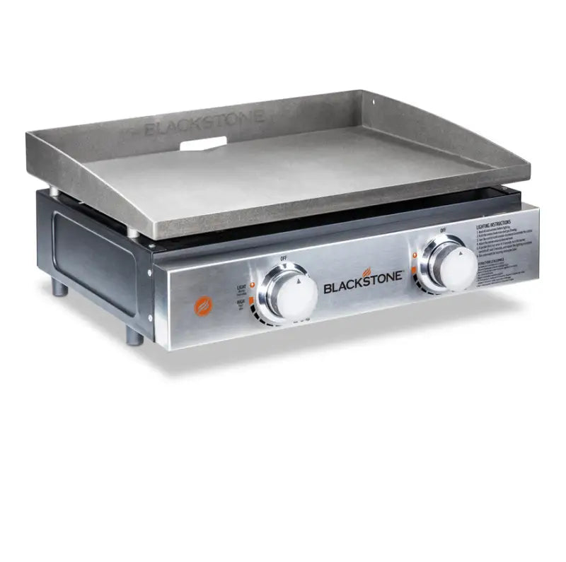 Silver Blackstone griddle for outdoor cooking on the 1666 N Atlantic I 22 tabletop setup