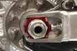 Motorcycle rear axle assembly with 17-205 Axle Blocks Elite Hon Red for enhanced fit