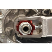 Motorcycle rear axle assembly with 17-205 Axle Blocks Elite Hon Red for enhanced fit