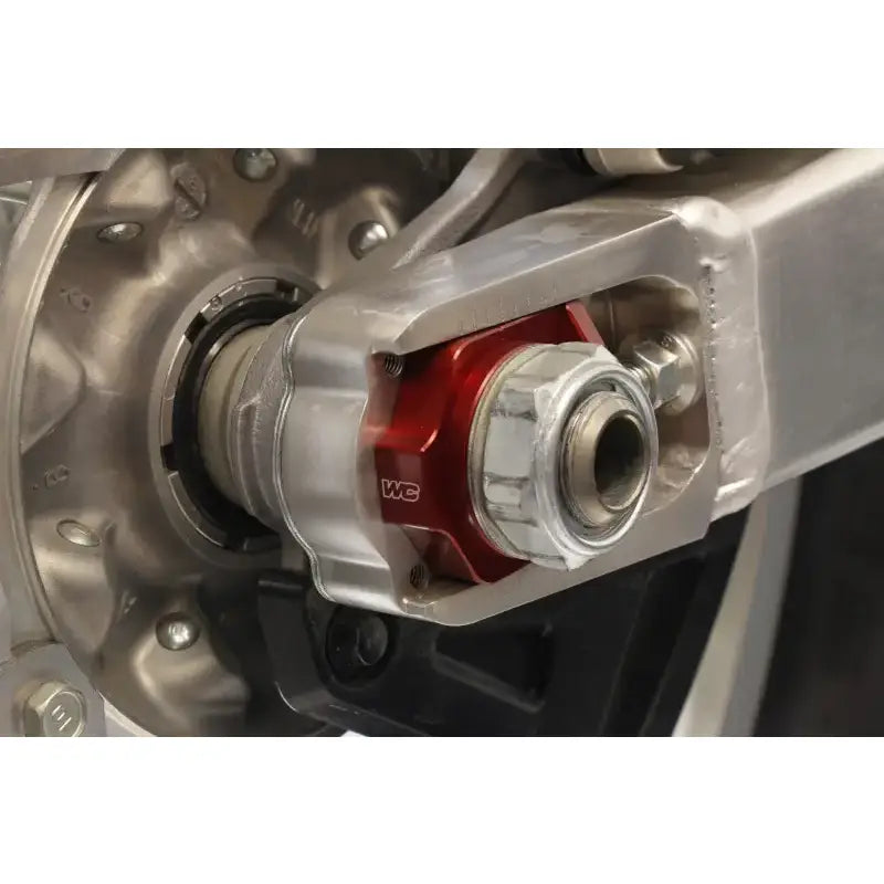 Motorcycle swingarm axle adjuster with Axle Blocks Elite Hon Red for precise tuning