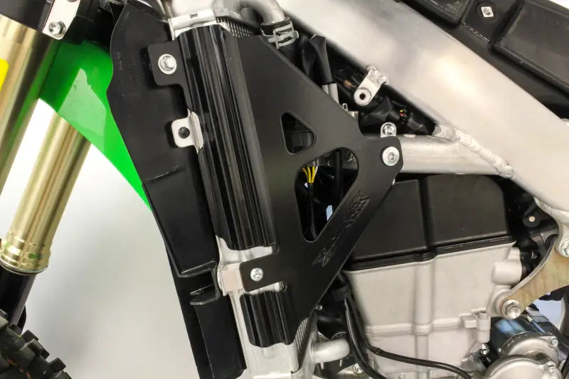 Black 18-B300 radiator braces on a motorcycle for extra protection and style