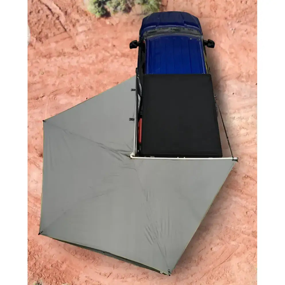 Nomadic 270 Lt Driver Awning attached to blue truck, ideal for RV, Automotive, Powersports, off-road, marine, truck bed, outdoor living, Exterior Parts & Accessories, AVADA - Best Sellers.