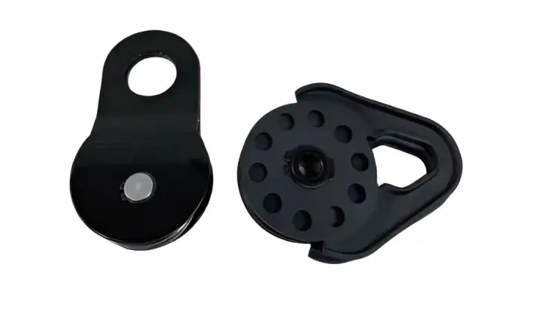 Black pulleys from the 19-1398 Overland Vcl 2 Pack Snatch Block Standard 16K