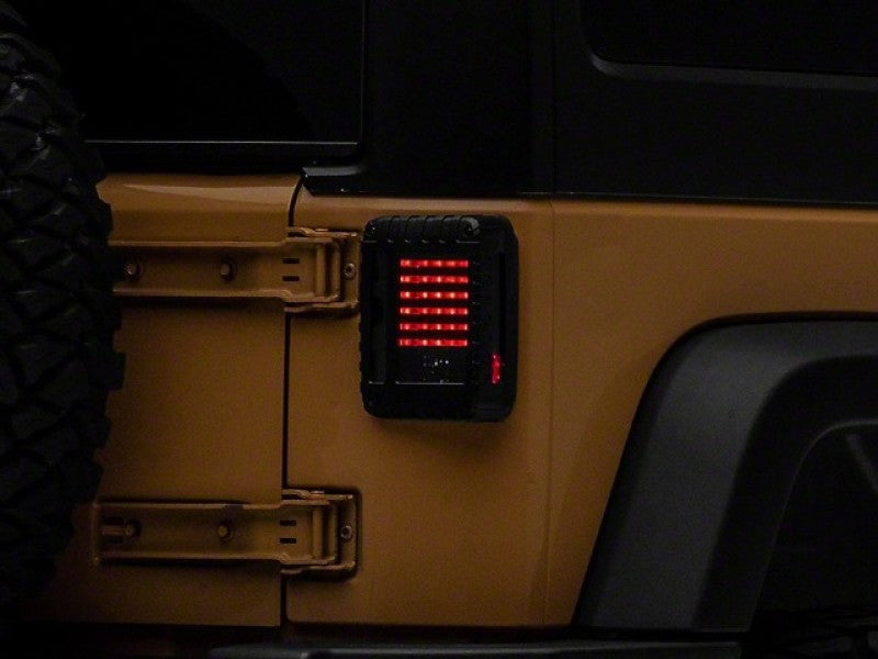 Raxiom J115435 Raxiom 07-18 Jeep Wrangler JK LED Tail Lights- Black Housing (Smoked Lens)
