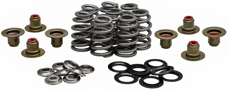 Engine valve spring kit with titanium retainers, seals, and springs for high performance