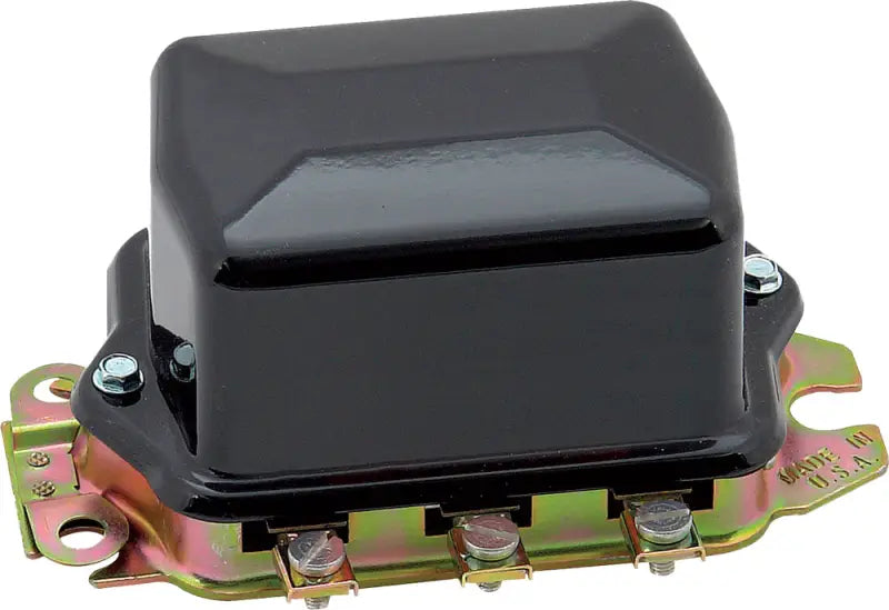 Black electro mechanical voltage regulator with gold mounting bracket and three terminals