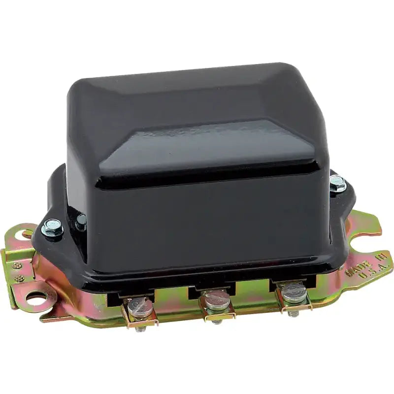 Black electro mechanical voltage regulator with gold mounting bracket and three terminals