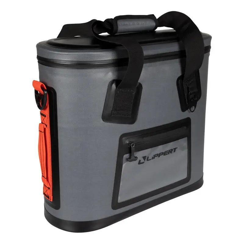 2021099913 Lippert Comp Adventure Cooler 30 - durable gray cooler with black handles, orange adjustable shoulder strap, integrated bottle opener, and front zip pocket.