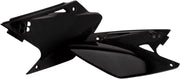 Black plastic motorcycle side panels in original factory shape for 2043410001