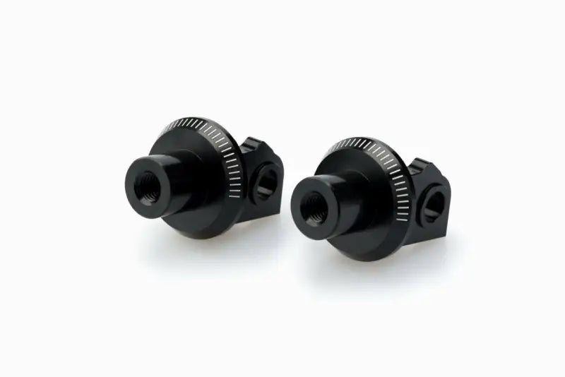Black cylindrical camera accessory mounts with white markings for 20452N footpeg adapter KTM racing footpegs