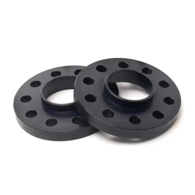 Two black H&R wheel spacers on 2065643MZ5SW H&R Wheel Spacer for added clearance