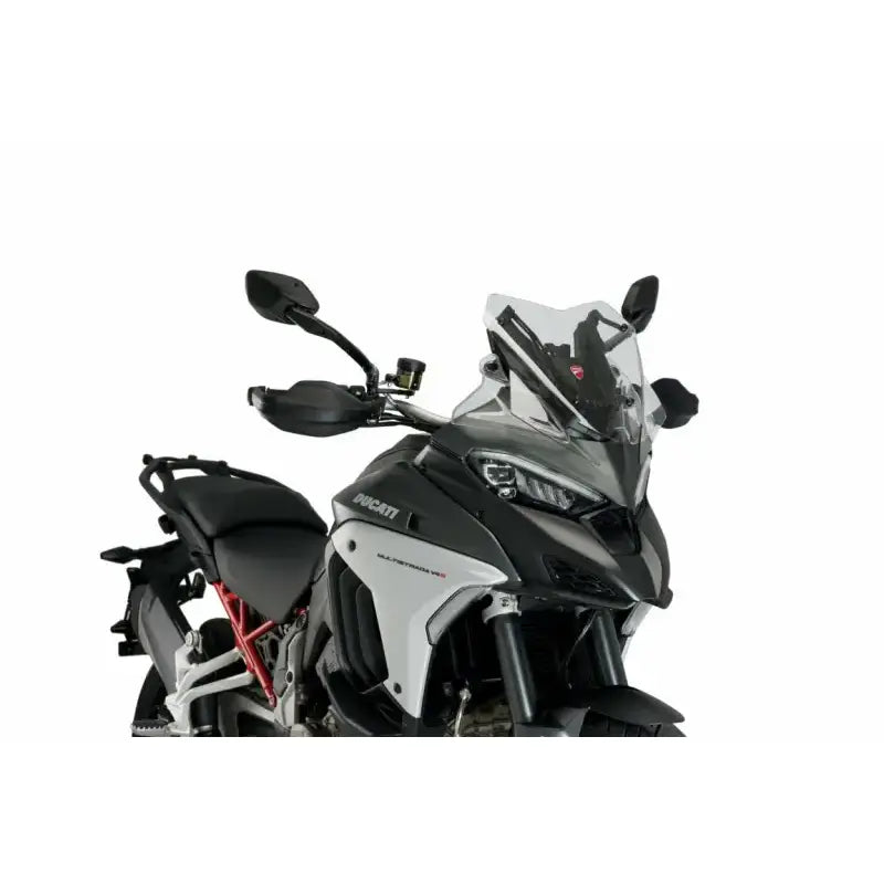 Black and silver adventure motorcycle with sport windscreen in RV parts & accessories section