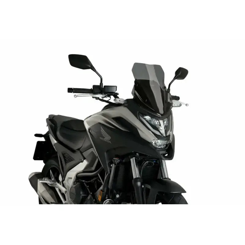 Black and gray Honda motorcycle with 20773F Windscreen Sport Dark Smoke for sleek look