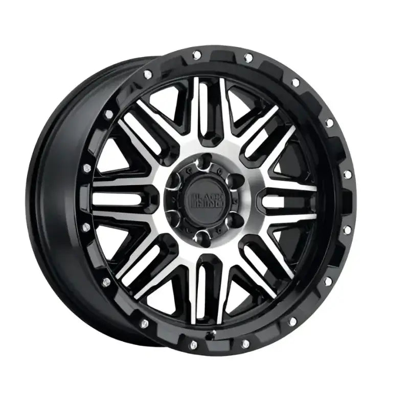 Black and silver Wheel Pros Black Alamo 20x9 wheel with rugged design