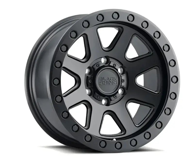 Black alloy wheel from Pros Br Baker Wheel Pros 20x9 with 6x120 bolt pattern