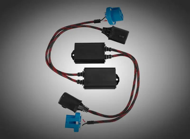 Black arc lighting tiny monster 9004 decoder harness boxes with blue and black connectors