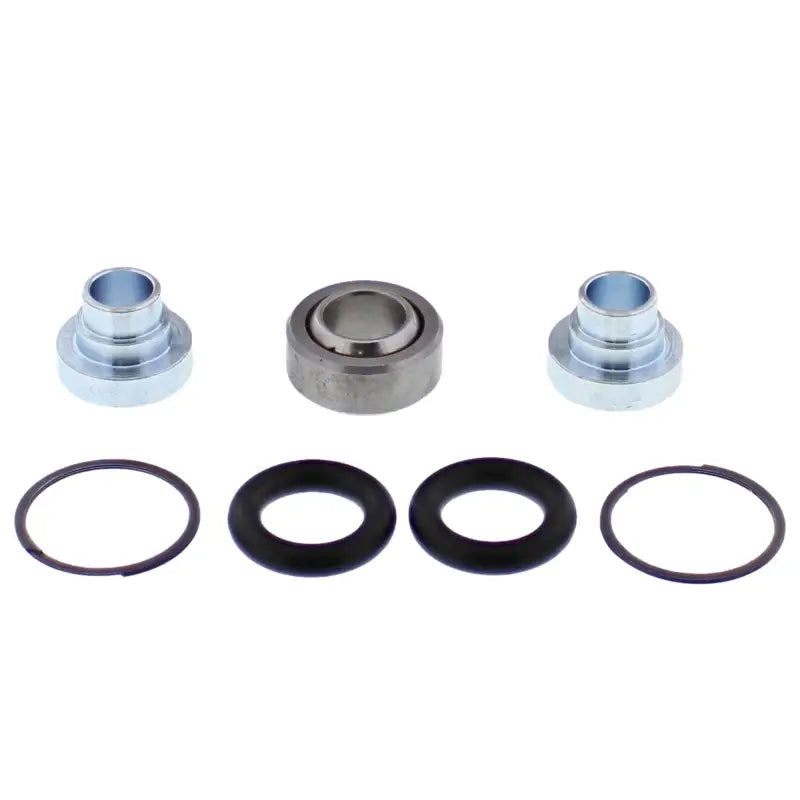 Shock bearing kit with spherical bearings, bushings, seals, and snap rings
