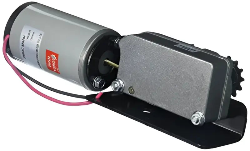 Silver motor with black gear and red wires on bal a-frame 6x11ga metal plate