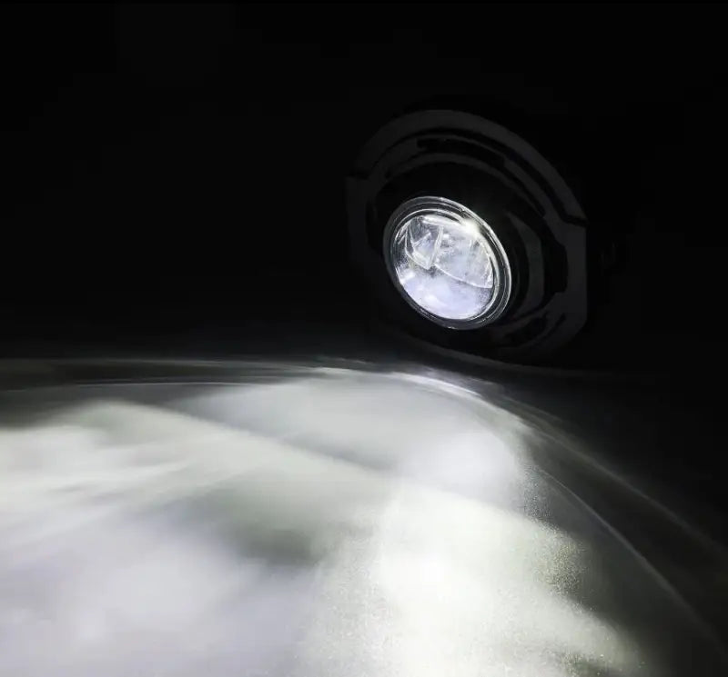 Driving/ Fog Light LED Bulb; LUXX Chip; Round; 12.2 Watt/ 12 Volt; Projector Beam; 720 Lumen For White/ 1200 Raw Lumen; Clear Polycarbonate Lens; Alpha-Black Polypropylene Housing; 6500 Degree Kelvin White Color Temperature; DOT/SAE Certified - NTP