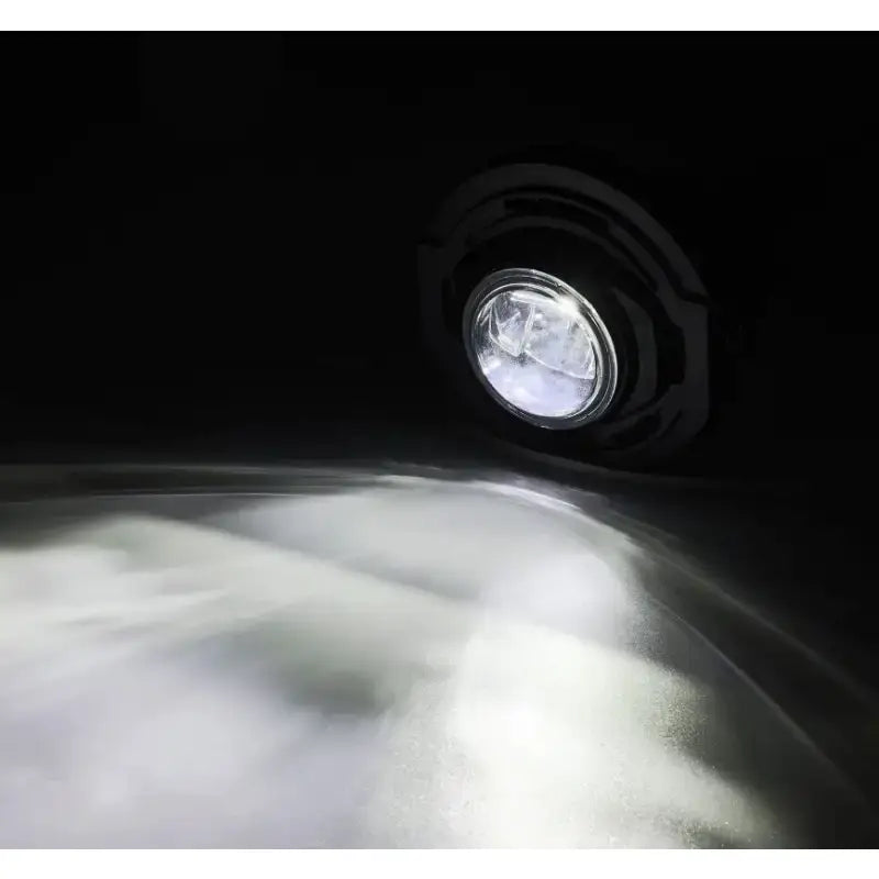 Driving/ Fog Light LED Bulb; LUXX Chip; Round; 12.2 Watt/ 12 Volt; Projector Beam; 720 Lumen For White/ 1200 Raw Lumen; Clear Polycarbonate Lens; Alpha-Black Polypropylene Housing; 6500 Degree Kelvin White Color Temperature; DOT/SAE Certified - NTP
