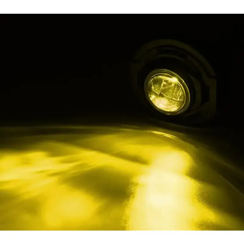 Driving/ Fog Light LED Bulb; LUXX Chip; Round; 12.2 Watt/ 12 Volt; Projector Beam; 720 Lumen For White/ 1200 Raw Lumen; Clear Polycarbonate Lens; Alpha-Black Polypropylene Housing; 6500 Degree Kelvin White Color Temperature; DOT/SAE Certified - NTP