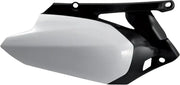 Original factory white black motorcycle side panels for a sleek look