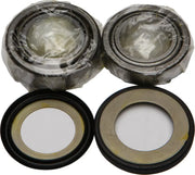 Four automotive steering bearings in the 22-1030 Bearing Seal Kit for steering bearing seal