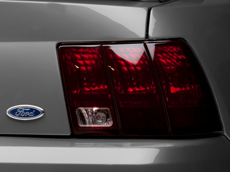 Raxiom 49080 Raxiom 99-04 Ford Mustang Excluding 99-01 Cobra Tail Lights- Black Housing (Smoked Lens)