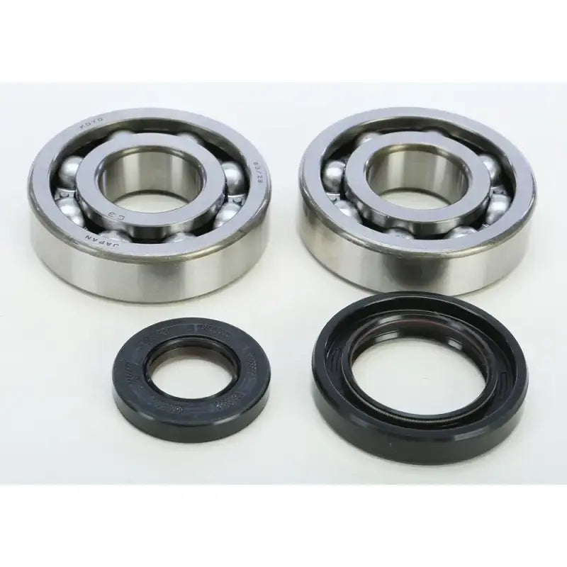 Two ball bearings and oil seals from the 23.CBS23098 crankshaft bearing seal kit for Yamaha RV parts