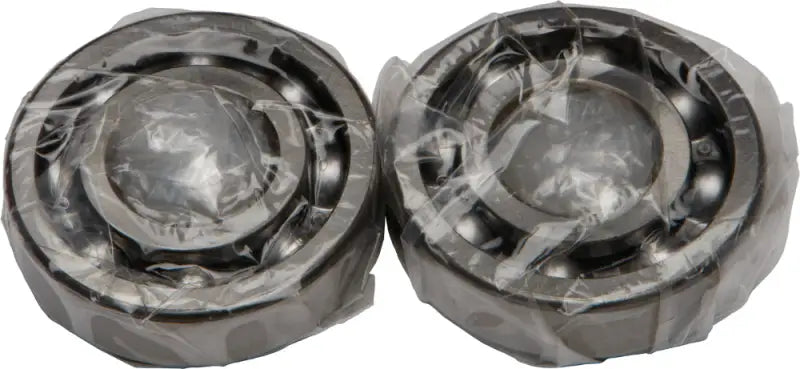 Two plastic-wrapped crankshaft bearings for seal kit replacement in the 24-1033 Crankshaft Bearing/Seal Kit