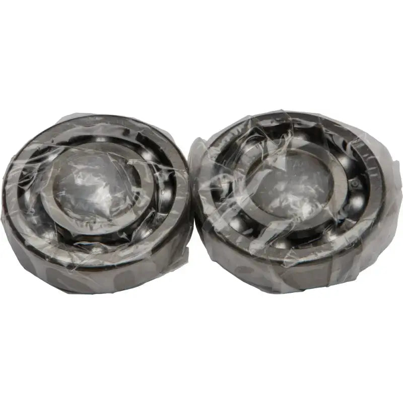Two plastic-wrapped crankshaft bearings for seal kit replacement in the 24-1033 Crankshaft Bearing/Seal Kit