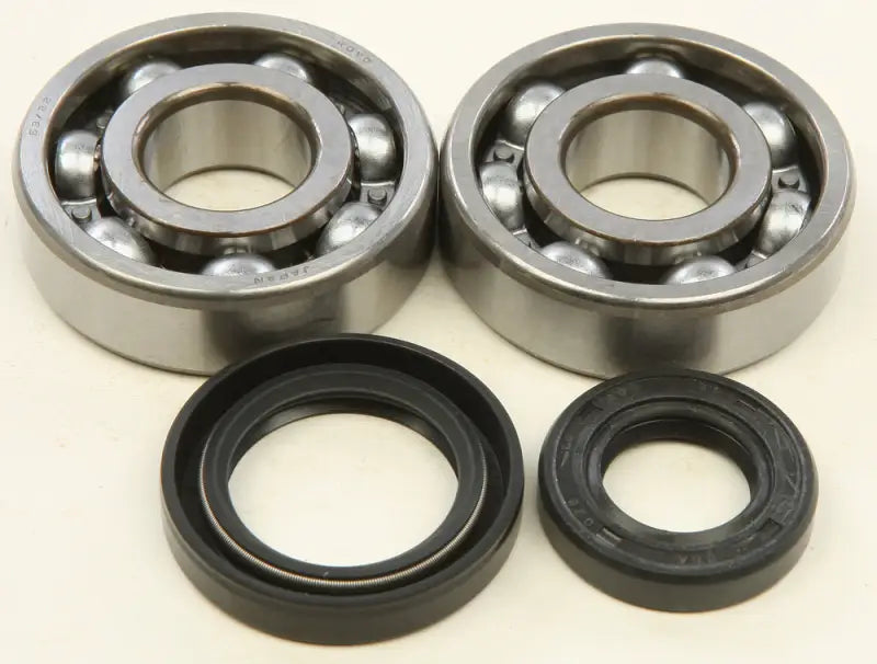 Two deep-groove ball bearings and oil seals from the 24-1075 Crankshaft Bearing Seal Kit, perfect RV parts & accessories