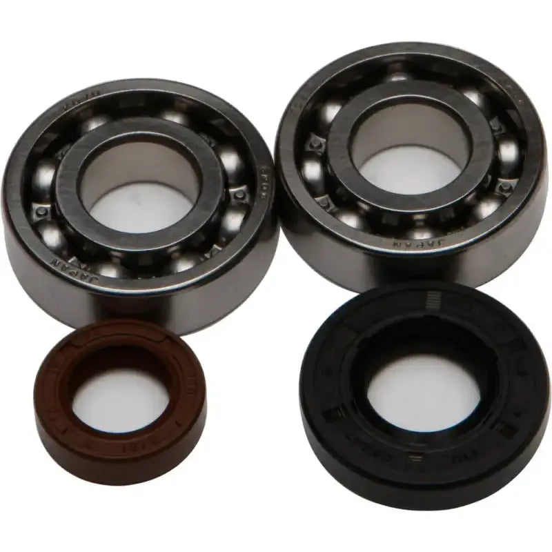 Two ball bearings and oil seals from the 24-1101 Crankshaft Bearing Seal Kit for RV parts & accessories