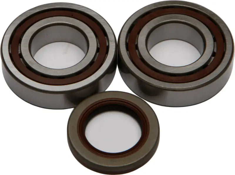 Two sealed ball bearings and an oil seal from the 24-1106 Crankshaft Bearing Seal Kit for RV parts & accessories