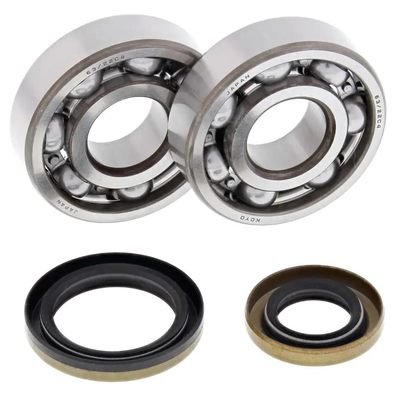 Two ball bearings and oil seals from the 24-1110 Crankshaft Bearing Seal Kit for RV parts & accessories