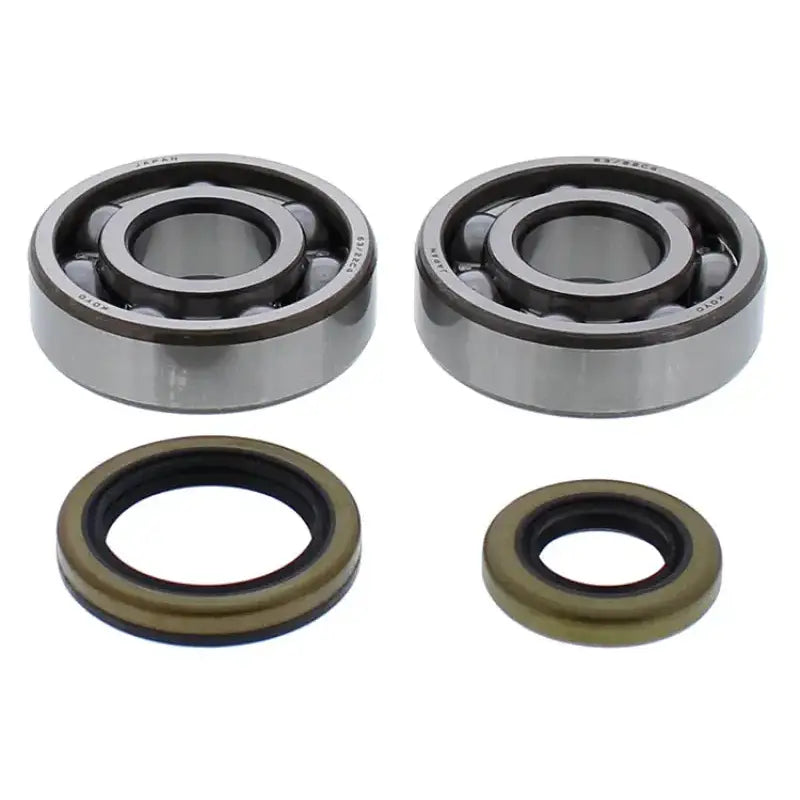 Two ball bearings and oil seals from the 24-1119 Crankshaft Bearing Seal Kit for RV parts & accessories