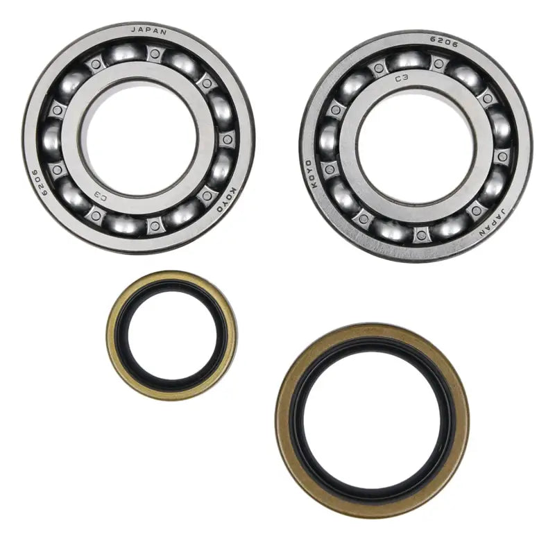 Two ball bearings and oil seals from the 24-1129 Crankshaft Bearing Seal Kit for RV parts & accessories