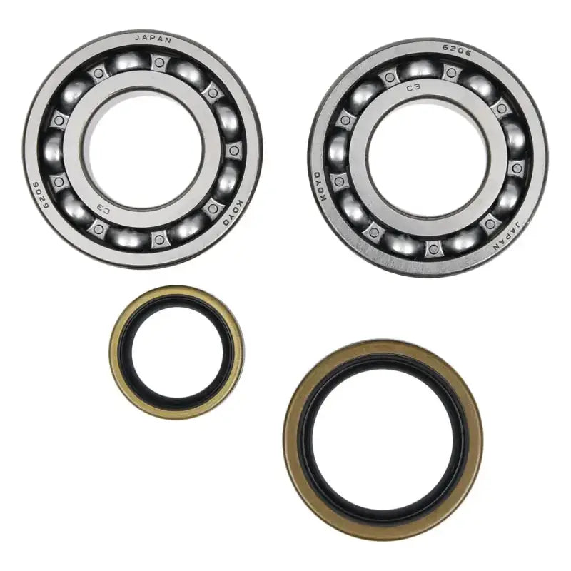 Two ball bearings and oil seals from the 24-1129 Crankshaft Bearing Seal Kit for RV parts & accessories