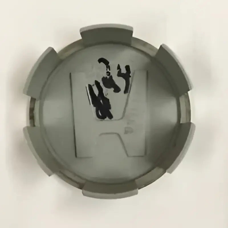 Gray Honda wheel center cap with enduro engineering skid and strong aluminum build