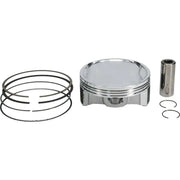 Piston kit with rings and wrist pin.