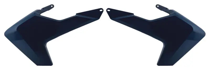 Dark blue motorcycle radiator shrouds showing two sleek fairings for radiators
