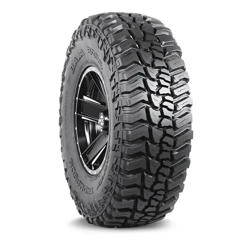 Off-road tire with aggressive tread pattern for Baja Boss Street LT285 55R20 vehicle