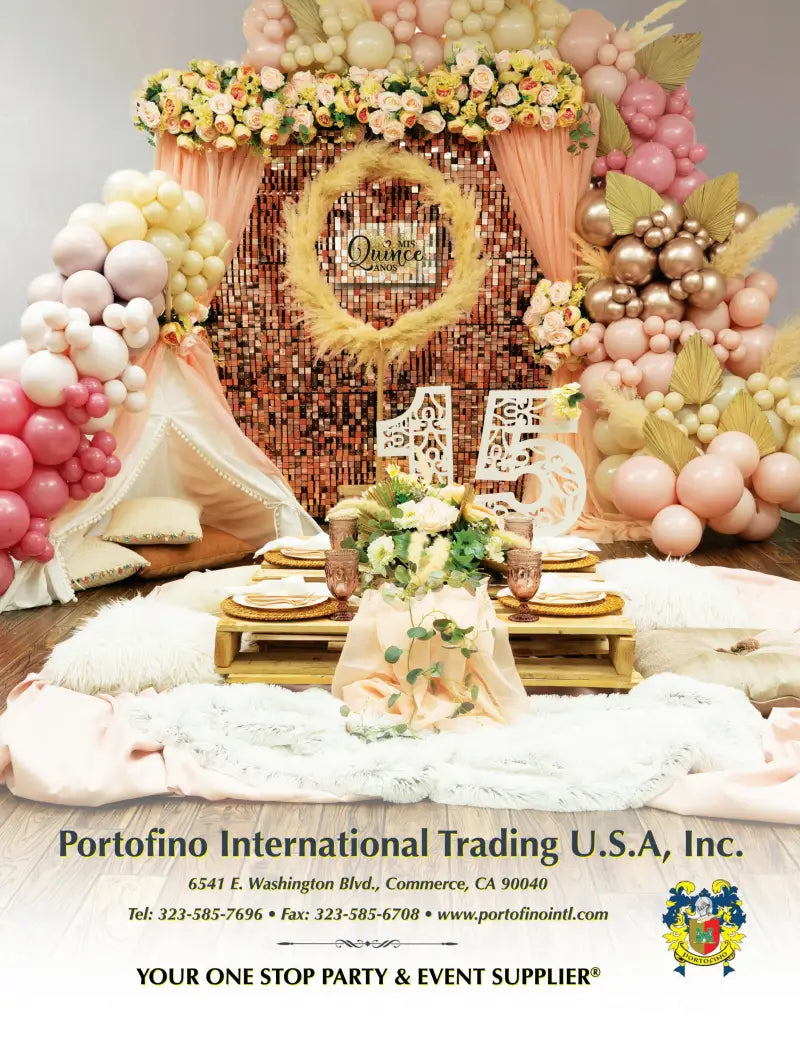 A beautifully decorated quinceañera celebration setup with elegant floral arrangements, balloons, and a glittering backdrop, featuring Portofino International Trading U.S.A., Inc.'s event supplies and decor.