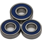 Three blue-sealed ball bearings from the 25-1242 Rear Wheel Bearing/Seal Kit