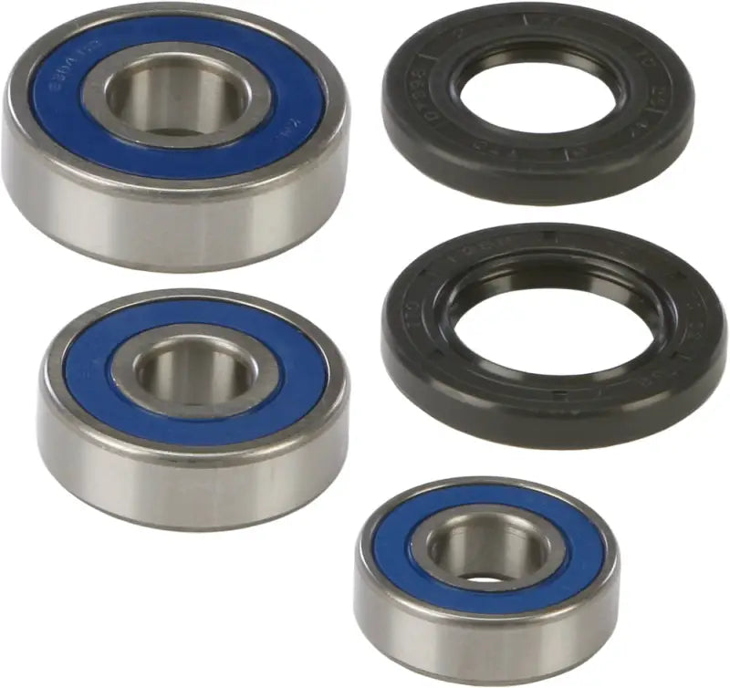 Wheel bearing and seal kit with metal bearings, blue seals, and black rubber seals