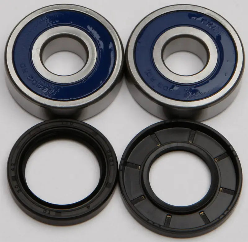 Two ball bearings with blue seals and black oil seals in 25-1333 Wheel Bearing Seal Kit