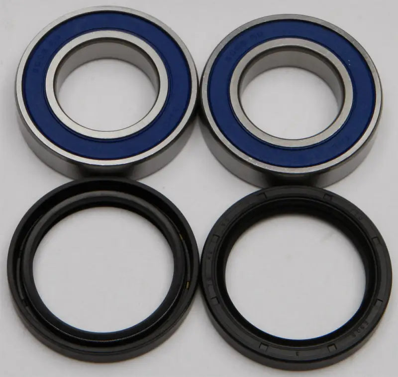 Wheel bearing kit with blue-sealed bearings and black rubber oil seals for smooth ride