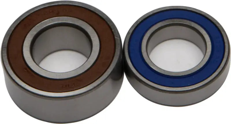 Two sealed wheel bearings with brown and blue seals in the 25-1675 Seal Kit