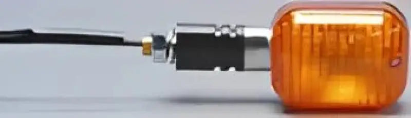 Amber-colored rectangular motorcycle turn signal with black silver stem for approved universal turn lights